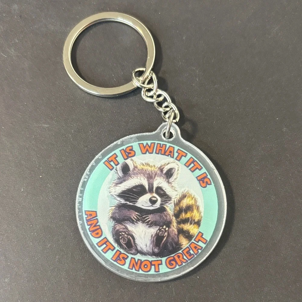 🔥RACCOON EMOTIONAL SUPPORT KEYCHAIN (IT IS WHAT IT IS)